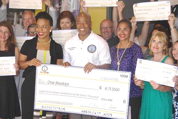 Brooklyn Borough President Eric L. Adams presented honorary checks to organizations that are helping to build the 