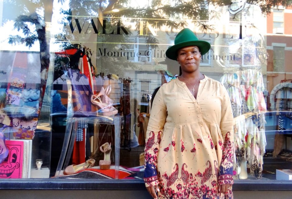 Monique, owner of "Walk-in Closet" pop-up consignment boutique