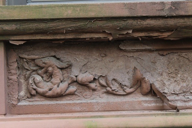 Time and weather has brought about this damage to the porous brown colored sandstone used in residential Park Slope; Photographer Sotero Bernal