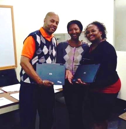 (l to r) Keith H. Burgess, CEO/executive director of the Dollicia F. Holloway Memorial Foundation, Inc.; La'Shawn Allen-Muhammad, executive director of The Central Brooklyn Economic Development Corporation; and Altanya Gerald-Burgess, COO/deputy executive director of The Dollicia F. Holloway Memorial Foundation, Inc.