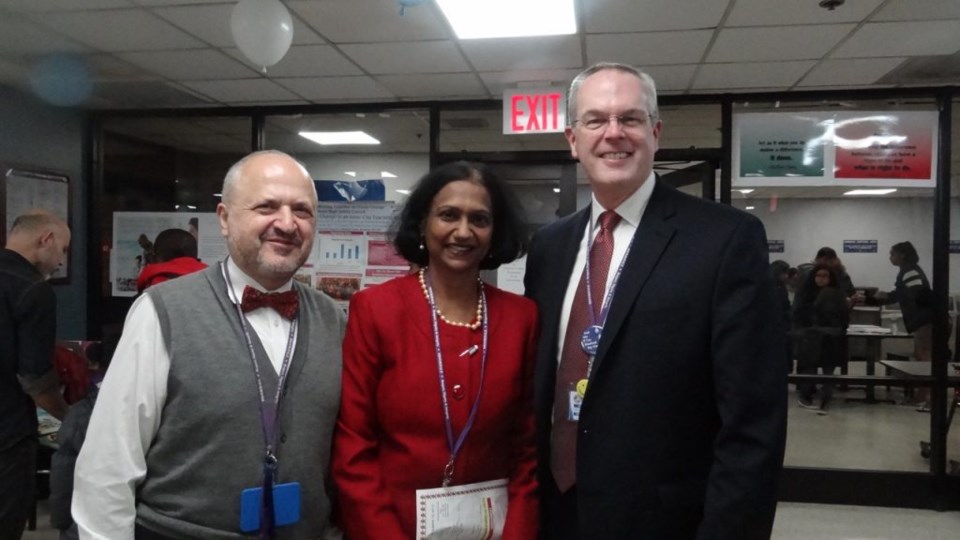 Dr. Kusum Viswanathan (center) and Brookdale Hospital President and CEO Mark Toney 