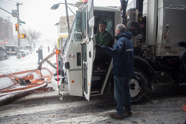 New York City Mayor Bill de Blasio thanks a sanitation worker plowing the streets as he inspects the conditions at Coney Island during a major snowstorm on Saturday, January 23, 2016. Michael Appleton/Mayoral Photography Office