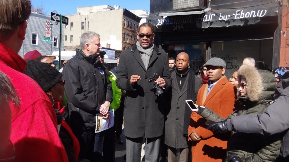 City Councilmember Robert Cornegy with Mayor Bill de Blasio at an impromptu press conference on Fulton St and Tompkins Ave., around the issue of affordable housing in his 36th Council District of Bed-Stuy and Crown Heights 