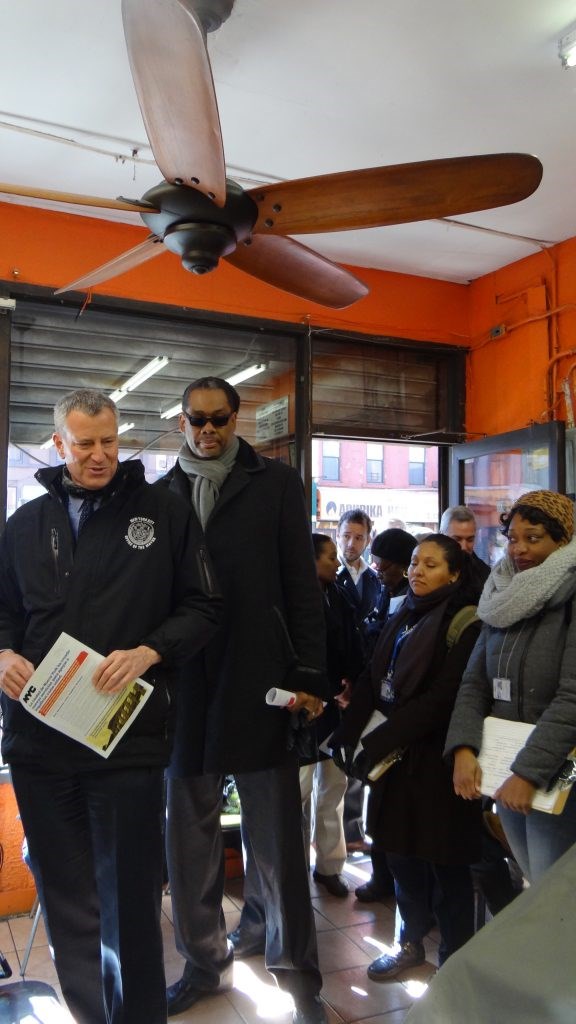 Mayor Bill de Blasio with City Councilmember Robert Cornegy at PJ's Hair Salon in Bed-Stuy