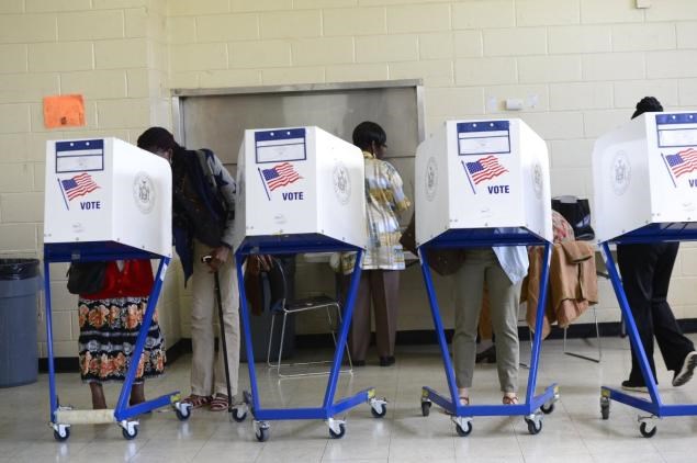 New York election official ousted after her error purged over 100,000 Brooklyn voters from the rolls, wreaking havoc at polls