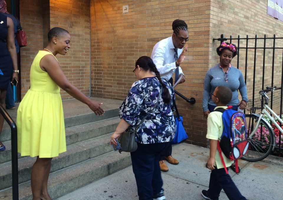 Gifted and Talented class at PS 26City Councilman Rob Cornegy high-fives students as they arrive for their first day of school at P.S. 26. Also pictured CB3 Chairperson Tremaine Wright and Denisha McPherson of the NSBE.
