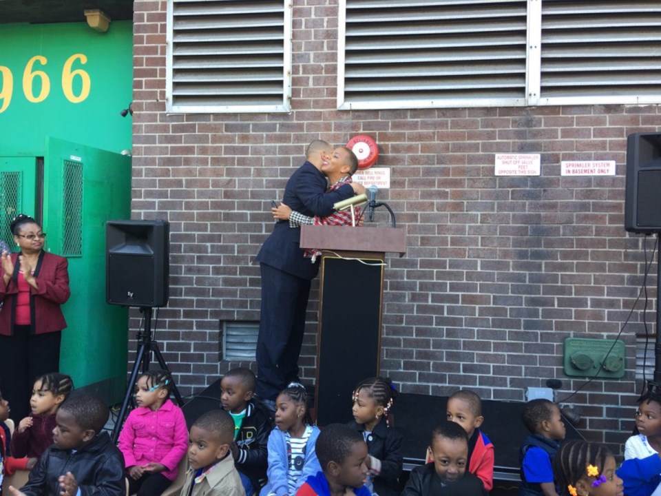 Congressman Hakeem Jeffries and City Councilmember Laurie Cumbo embrace at a press conference announcing that the Fort Greene Senior Citizens Council and Center would be signing a new lease.