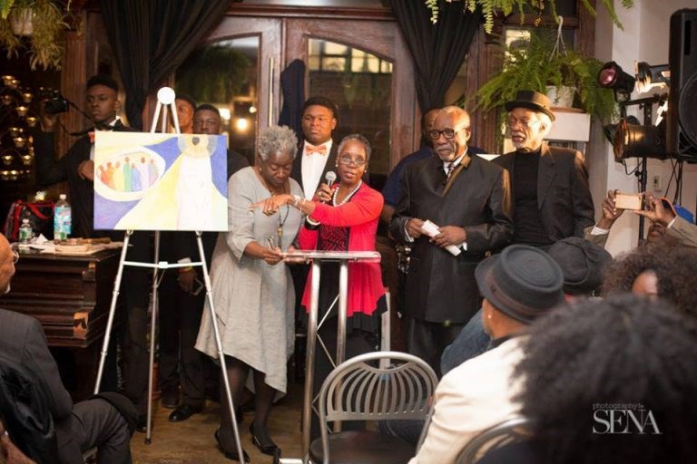 Fedrecia Hartley, founder and owner of Zion Gallery, at the Painting it Forward 2015 art auction.