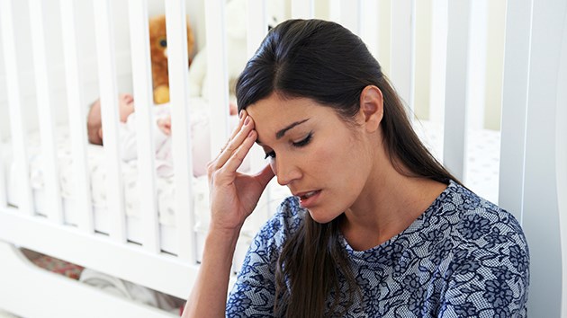 Frustrated Mother Suffering From Post Natal Depression