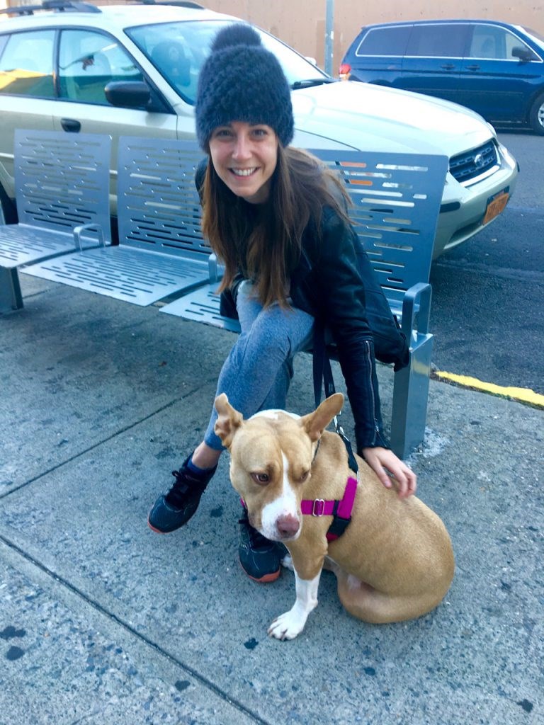 Shana Barhamand, watching the dog as her friend votes inside