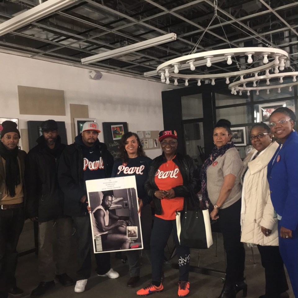 Janie Washington-Bennett (4th from right) with volunteers who are campaigning for signatures to turn Belmont Avenue in Brownsville to "Dwayne Pearl Washington Way."