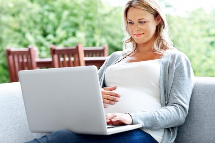 a-pregnant-woman-using-a-computer