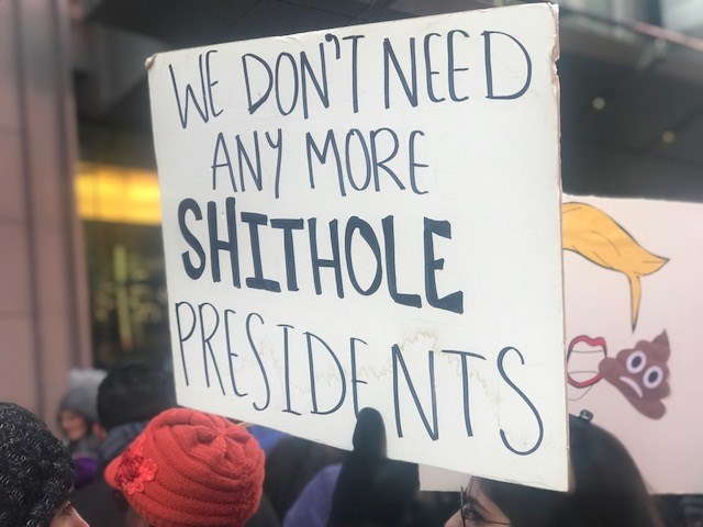 Haiti Cultural Exchange, Rally Against Racism, Times Square, Harry Djanite, Haitian Community, New York City, protest, racism, Donald Trump, shithole countries