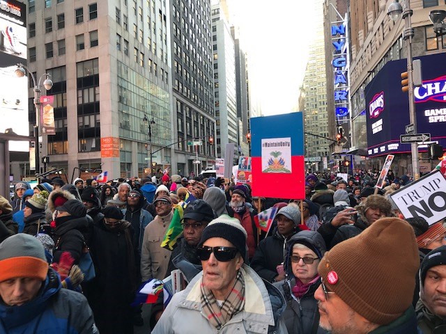 Haiti Cultural Exchange, Rally Against Racism, Times Square, Harry Djanite, Haitian Community, New York City, protest, racism, Donald Trump, shithole countries