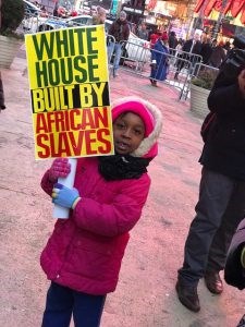 Haiti Cultural Exchange, Rally Against Racism, Times Square, Harry Djanite, Haitian Community, New York City, protest, racism, Donald Trump, shithole countries