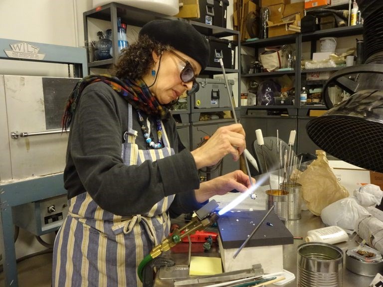 Maria Aroche, a Bead Project alum and teaching assistant, can craft a bead in mere minutes.