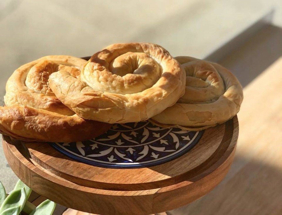 Hand-made spanakopitas, cheese pie and mpougatsa