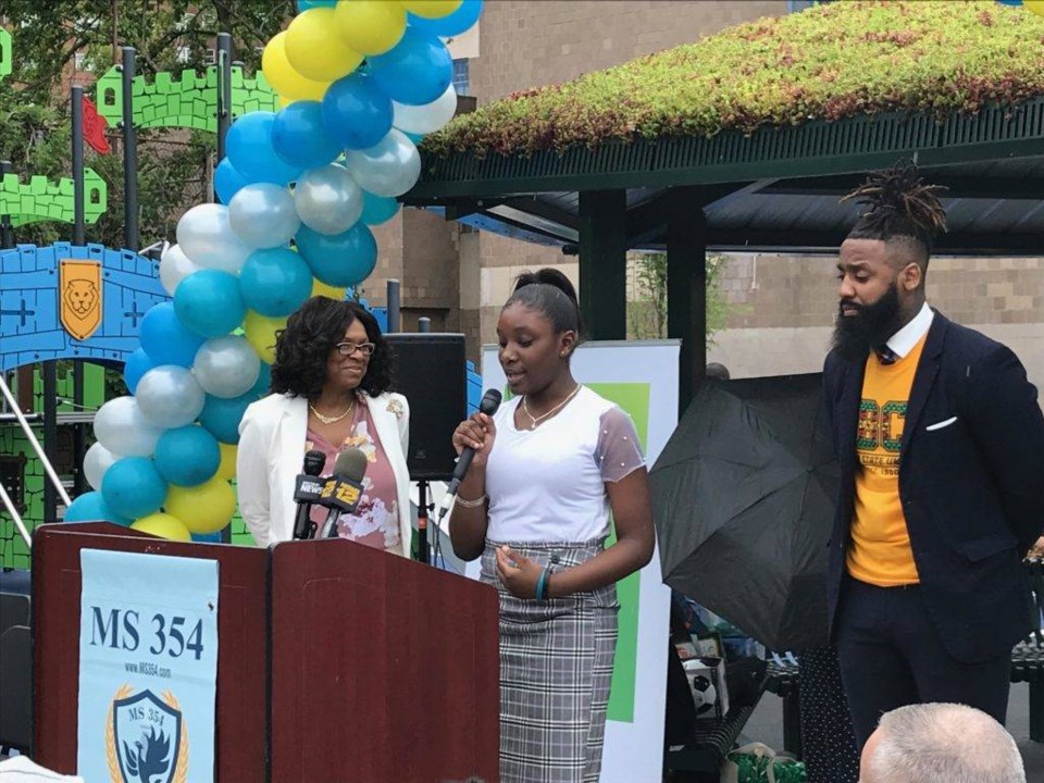Principal Monique Campbell, Student Reia Mason, and Principal Antoine Lewis gave opening remarks at the ceremony