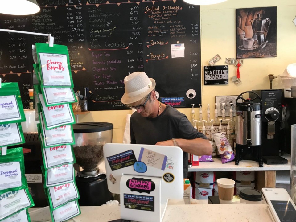 Ian-ford-behind-counter