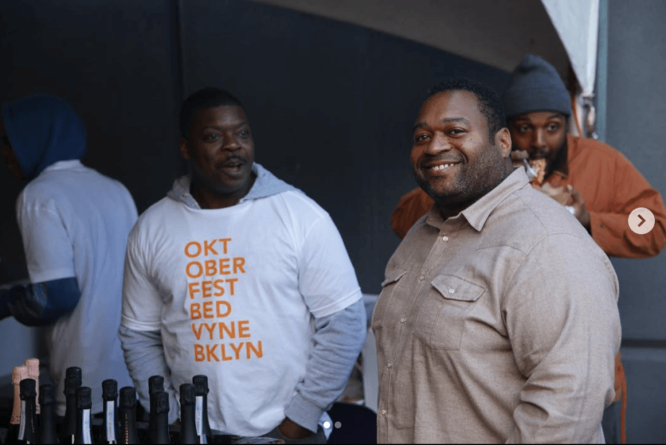 Bed-Vyne owner Michael Brooks, on the right, smiles at 2018's Oktoberfest