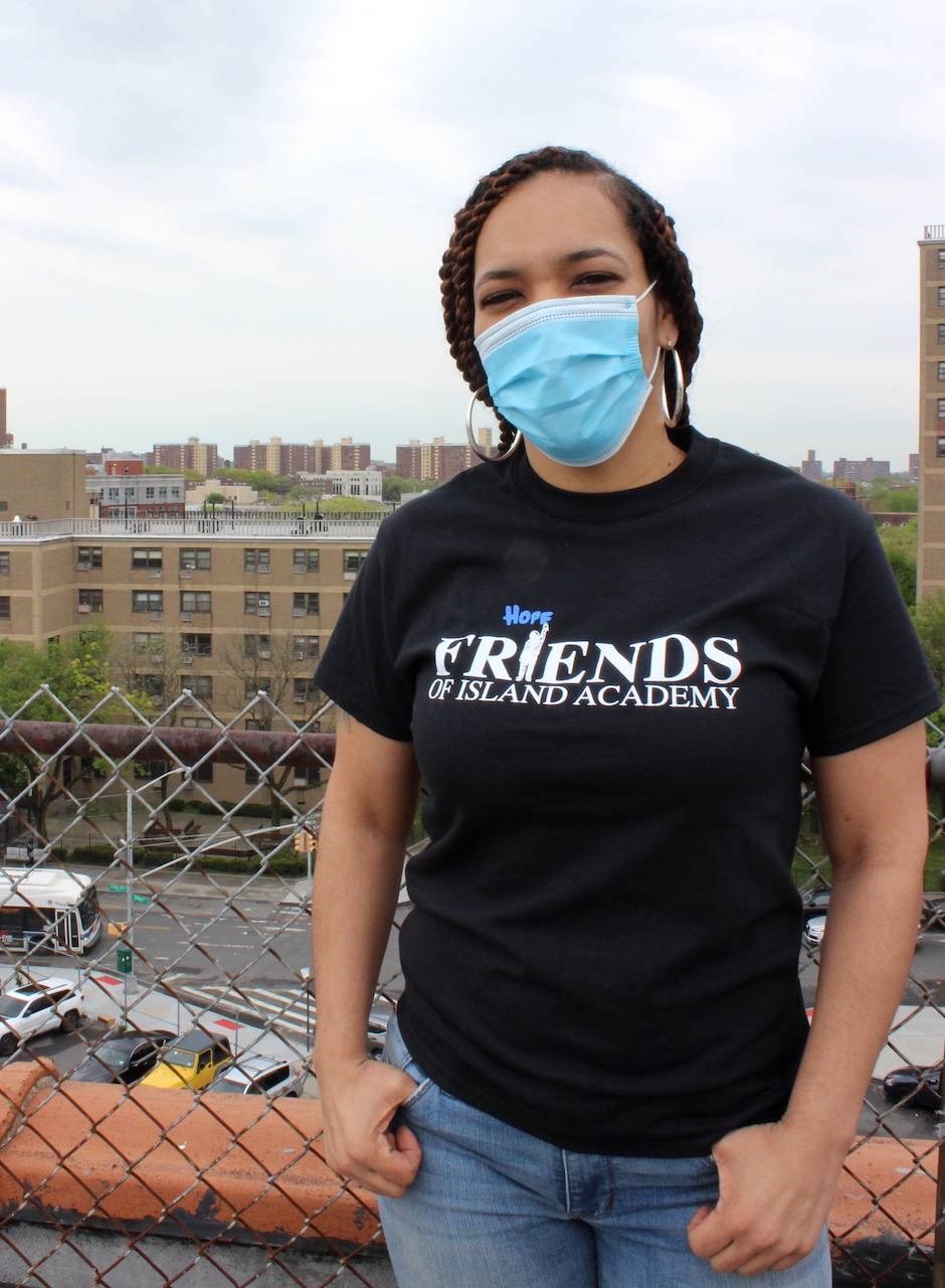 Venus Core stands in front of the Brownsville skyline. Photo: Anna Bradley-Smith for BK Reader.