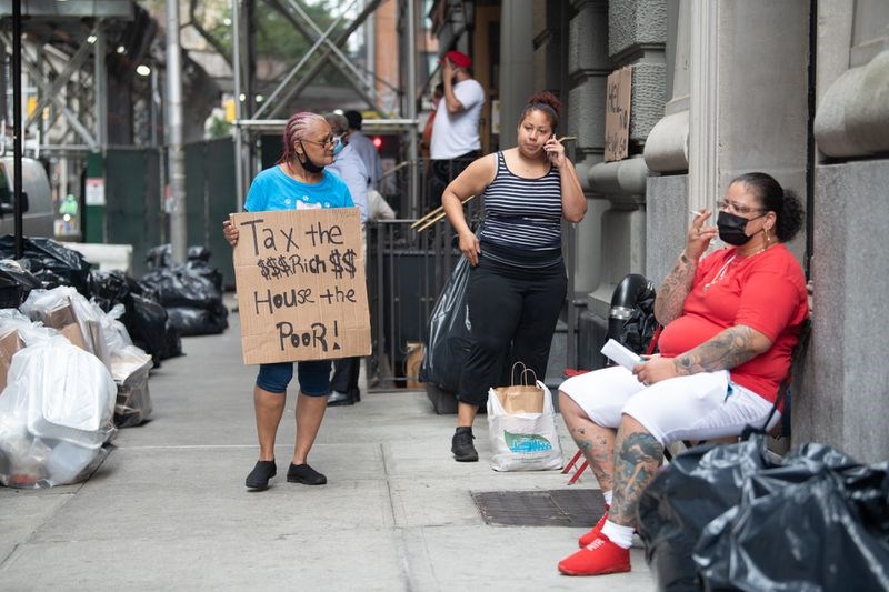 NYC shelter residents say city officials contacted them Wednesday, a week after trying to relocate them, to warn a future move could happen
