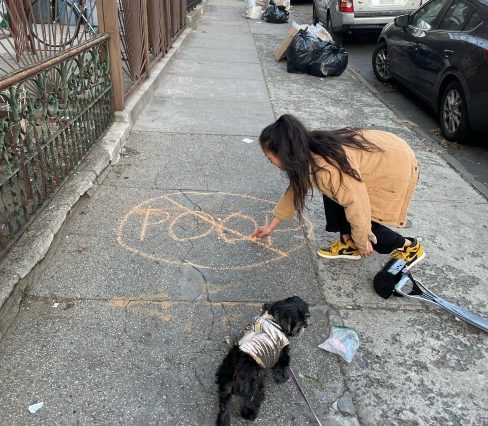 Kathy Kim and her pooch taking action. Photo: Provided by Kathy Kim.