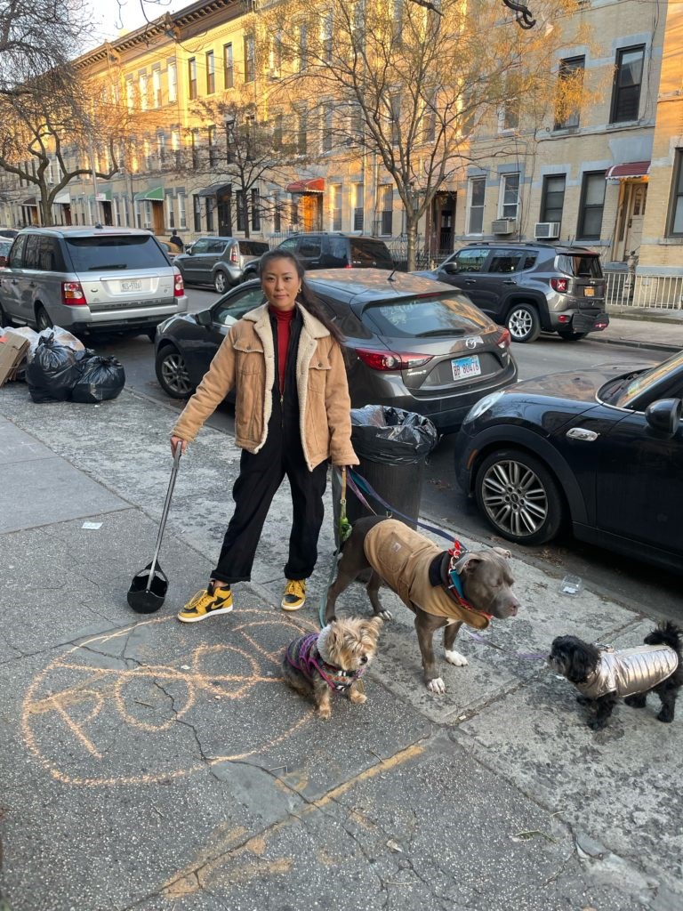 .Kathy Kim, her pooper scooper, and her dogs. Photo: Provided by Kathy Kim