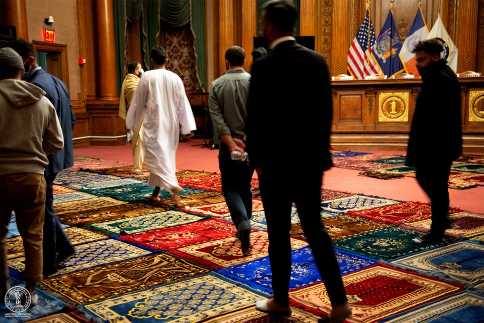 A group of people in a room during Iftar event on April 19, 2022.