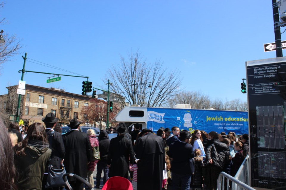 A passing-by Mitzvah Tank, blasting fun tunes. Photo: Miranda Levingston for the BK Reader.