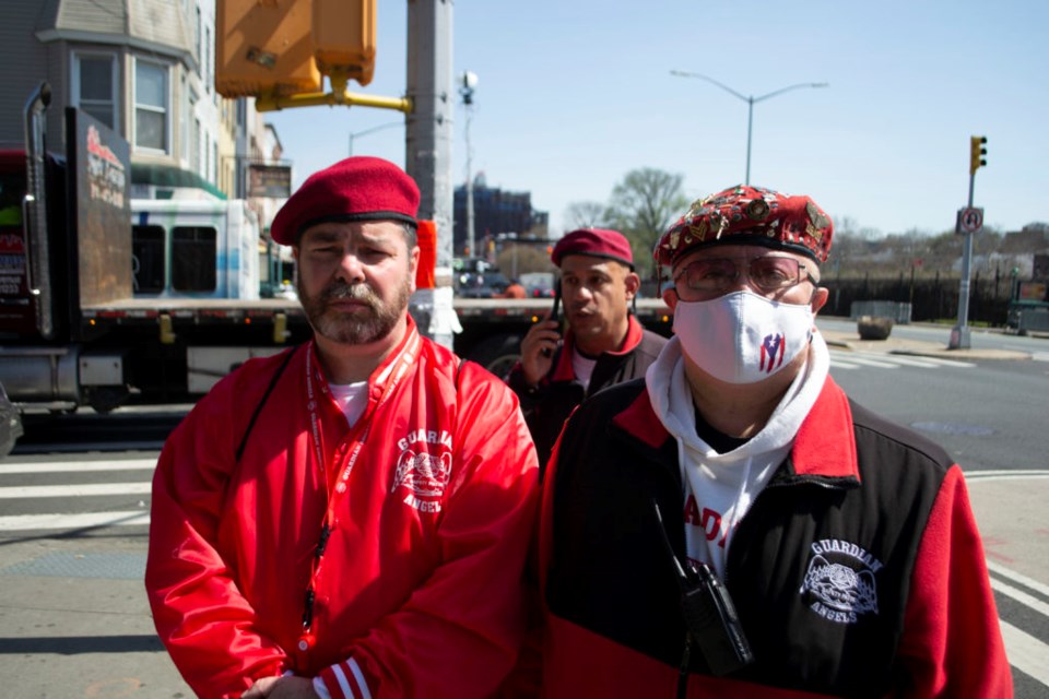 Steve Saletros and Jose Masterreno, members of the Guardian Angels crime-prevention nonprofit.