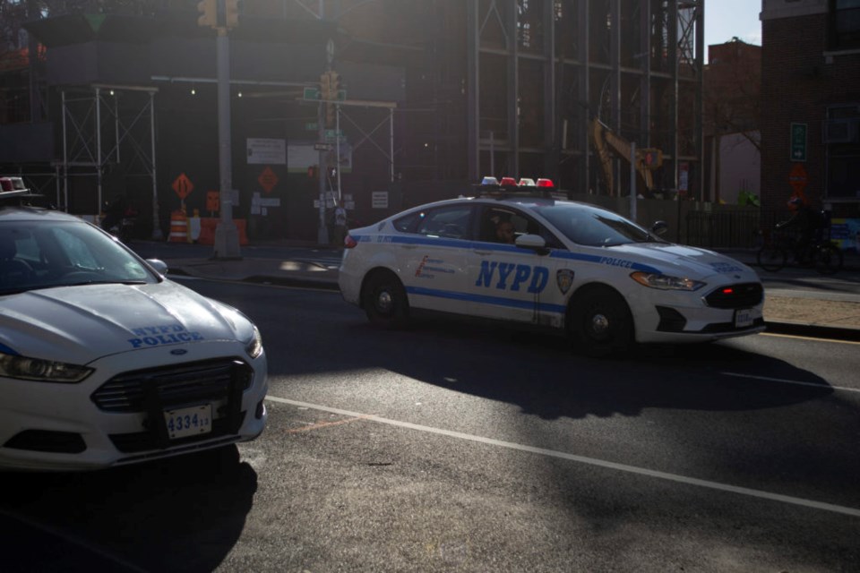 An NYPD cruiser on 4th Avenue