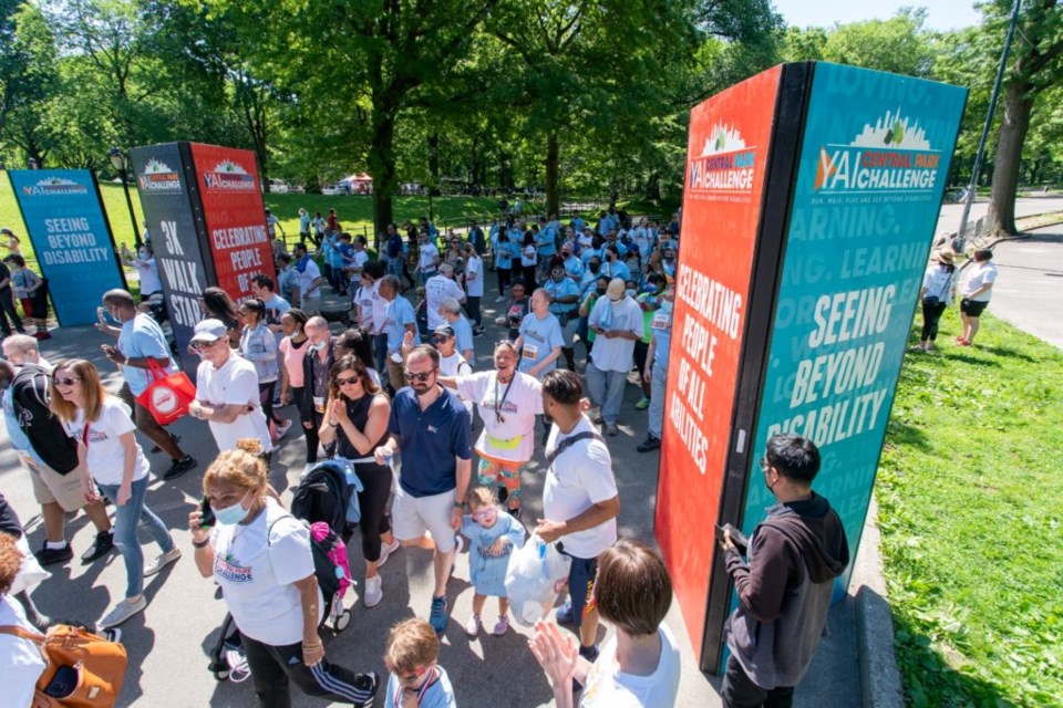 A crowd of people at the 2022 YAI Central Park Challenge.