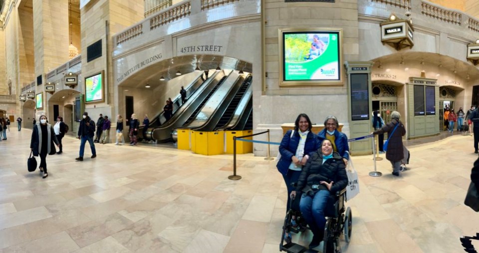Lakshmee Lachhman-Persad, with her sister Annie Lachhman and their mom in Grand Central Terminal to check out the MTA Away ads.