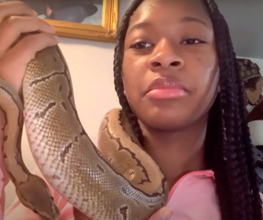 Animal lover Sanaa Akesson holds pet snake