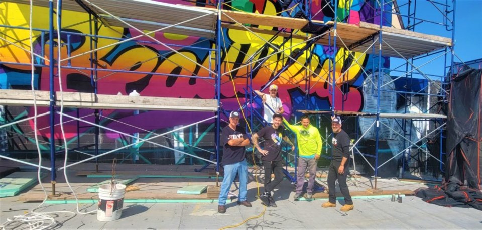 From left to right: Tony Polizzi, Jessie Salinas (on scaffolding) Jason Naylor (below), Such, and Salvatore Polizzi