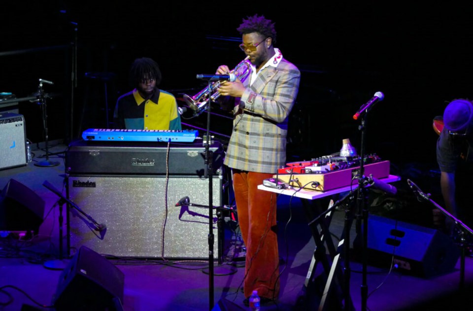 Maurice Brown plays the trumpet on stage. Photo: Katey St. John for the BK Reader.