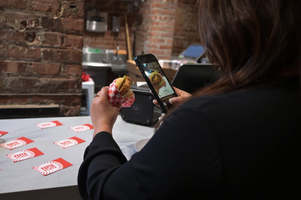 The phone eats first. Photo: Jonathan Mora for the BK Reader.