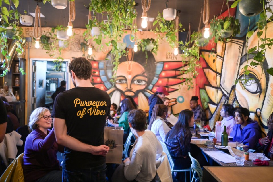 Staff t-shirts read, "Purveyors of Vibes." Photo: Jonathan Mora for the BK Reader. 