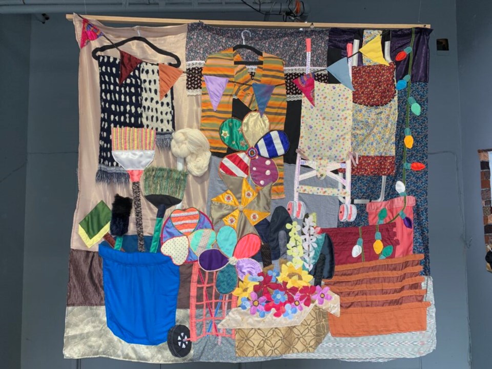 "General Store," a quilt hung in the center of the Plus/Space at FiveMyles Gallery. Photo: Thao Nguyen for the BK Reader.