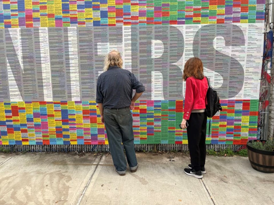 People look at the art piece on Nov. 6, two days ahead of the midterm elections. Photo: Jonathan Mora for the BK Reader.