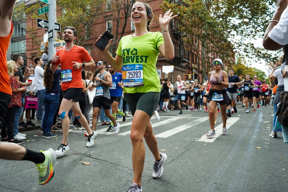Photo coverage of City Harvest marathon runners.