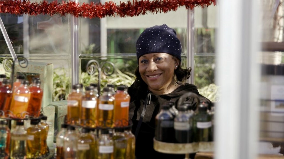 Vendor Julia File, of JJ and X Fashion, sells her wares at the holiday market. Photo: Provided/ Bed-Stuy Gateway BID.