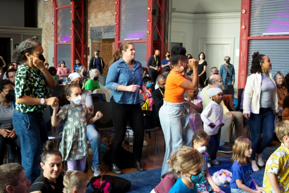 Parents and kids watch as hip hop artist Fyütch performs at the Brooklyn Academy of Music, Nov. 5. Photo: Will Fritz for the BK Reader.