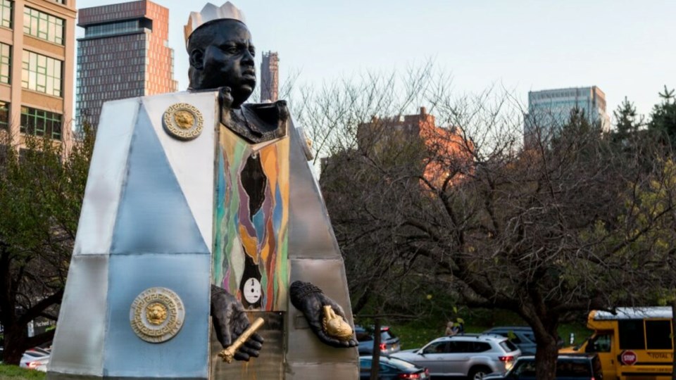 A new sculpture at the foot of the Brooklyn Bridge pays tribute to hip-hop legend Christopher ‘the Notorious B.I.G.’ Wallace.