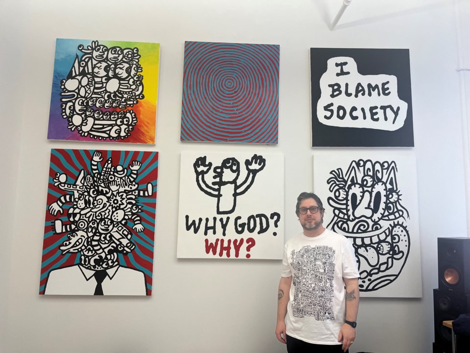 Mixed-media artist Noah Lyon soaks in his the energy of his subsidized studio space.
Photo: Natasha Knows for BK Reader.