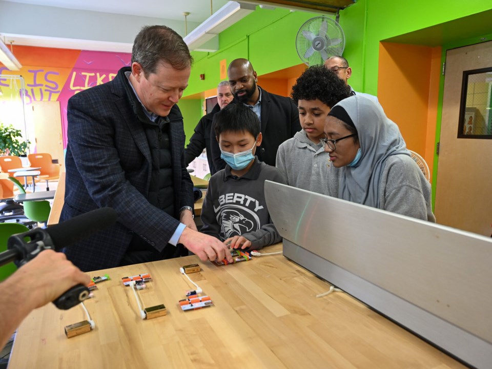 Rich Davey looks at the students' prototype. Photo: Jessy Edwards for BK Reader.