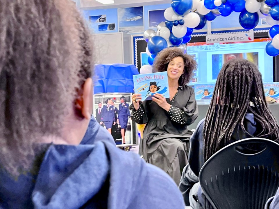 Karyn Parsons engages students with a reading of her new children's book Photo: Provided/American Airlines.