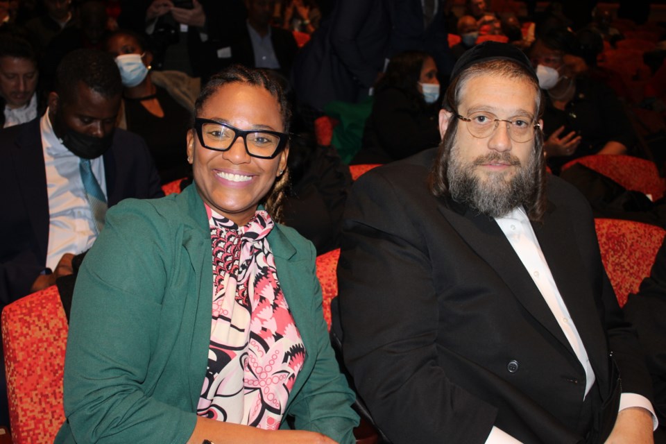 Deputy Borough President of Queens Ebony Young (left) and local Rabbi Moshe Indig (right). Photo: Miranda Levingston for BK Reader.