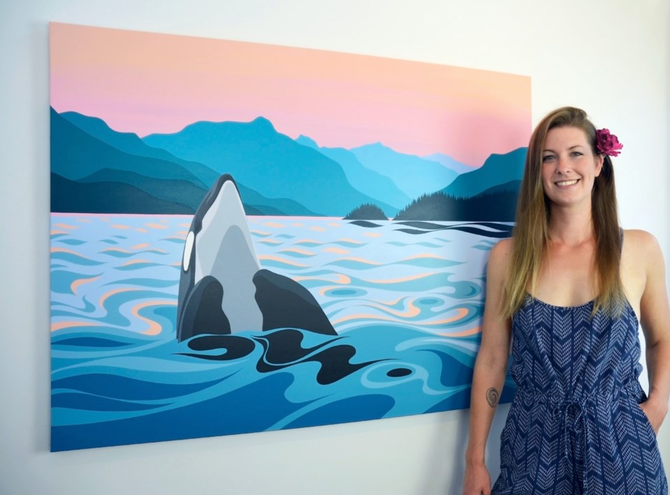 Di with a painting of an orca